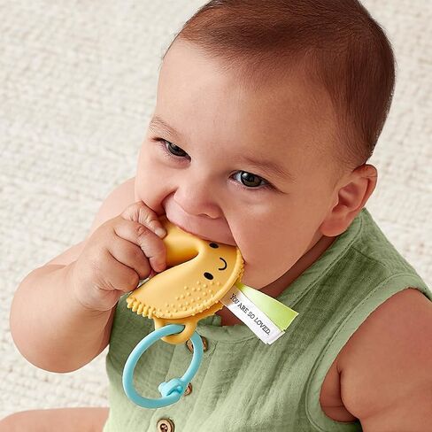 Itzy Ritzy Fortune Cookie Teether - BPA-Free Soft Silicone Baby Teething Toy with Satin Sensory Ribbons and Silicone Ring - for Ages 3 Months and Up (Fortune Cookie) in Kuwait