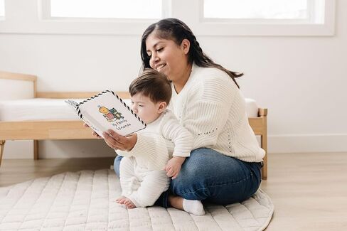 Baby's First Photo Album Soft Fabric, Holds 17 Photos, Built-In Baby Safe Mirror & High Contrast Images, Wipe Clean, Keepsake Gift for Newborns, Infants & Toddlers in Kuwait