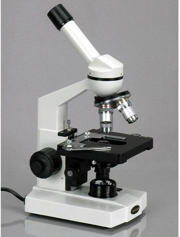 AmScope M600 Compound Monocular Microscope, WF10x Eyepiece, 40x-1000x Magnification, Brightfield, Tungsten Illumination, Abbe Condenser, Mechanical Stage, 110V | 40X-1000X Magnification Range Compound Biological Microscope Mechanical Stage Brightfield Ima in Kuwait
