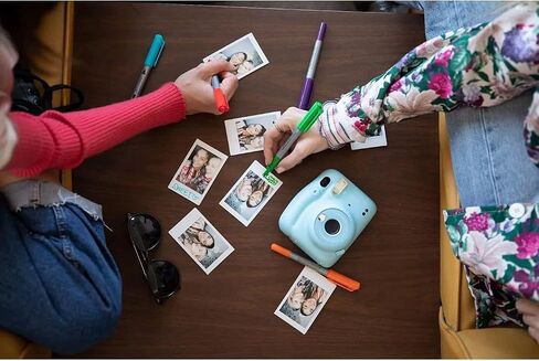Fujifilm Instax Mini 11 Instant Film Camera with Automatic Exposure and Flash, Fujinon 60mm Lens with Selfie Mirror, Optical Viewfinder Polaroid Cameras for Pro or Beginners - Lilac Purple (Renewed) in Kuwait