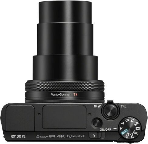Sony CyberShot RX100 VII + 64GB Extreme Memory, Wireless Lavalier Microphones, Shooting Grip Tripod w/Remote Shutter, Selfie Stick, Case, Grip, Software, and More (Pro Video Creator Bundle) (Renewed) in Kuwait