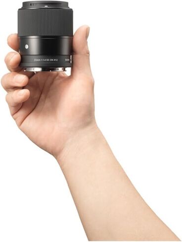 Sigma 23mm f/1.4 DC DN Contemporary Lens (Leica L) 348969 APS-C Format - Bundle with 128GB Memory Card, Tripod, and More in Kuwait