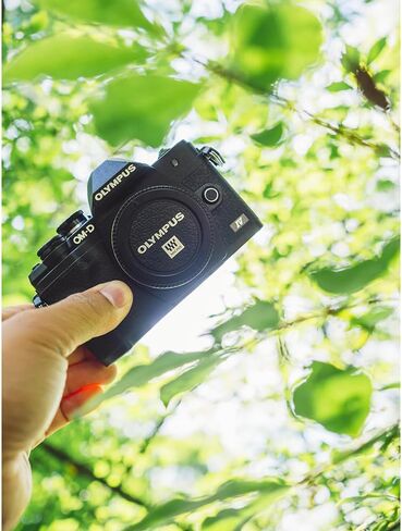 OM Systems Olympus OM-D E-M10 Mark IV 20MP Digital Camera Body Black V207130BU000 Bundle with Deco Photo Camera Bag, Lexar Blue Series 64GB SDXC Memory Card and Corel Photo Video Suite PaintShop Pro in Kuwait