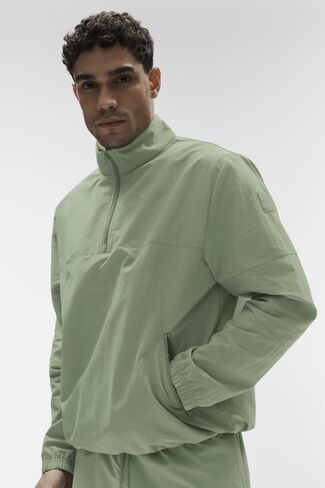 Alo Yoga Light Weight Takeaway Track Pullover - Dune Grass in Kuwait