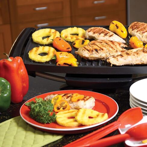 George Foreman Indoor/Outdoor Electric Grill with Stand | Indoor or outdoor electric grill with nonstick surface, 5 heat settings and fat-removing drip tray for healthier grilling. in Saudi Arabia
