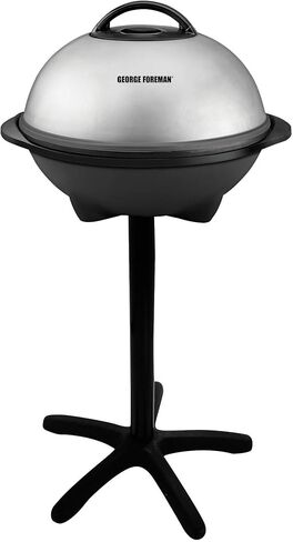 George Foreman Indoor/Outdoor Electric Grill with Stand, 15-Serving | 15-serving electric grill with removable stand, 5 heat settings and fat-removing slope for healthier grilling. in Saudi Arabia