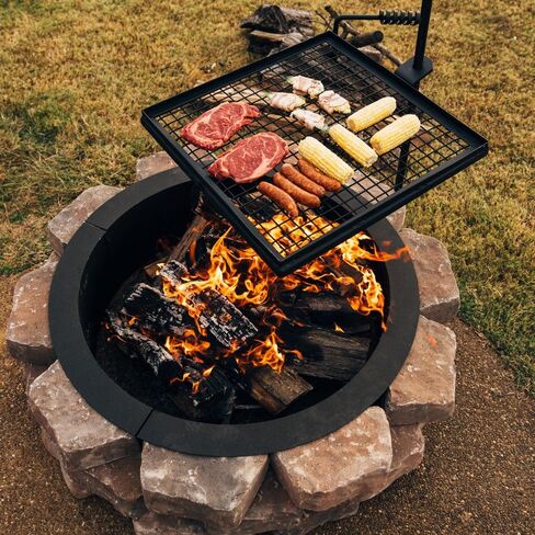 TITAN GREAT OUTDOORS شواية دوارة قابلة للتعديل من Ash & Ember، شبكة طبخ من سلك شبكي فولاذي مع عمود سبايك، معدات تخييم محمولة للشواء مفتوحة النار in Kuwait