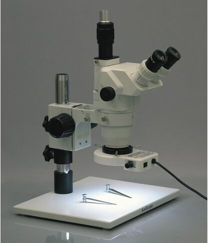 AmScope ZM-1TZ مجهر تكبير ستيريو ثلاثي العينيات احترافي، عدسات EW10x، تكبير 3.35X-90X، هدف تكبير 0.67X-4.5X، إضاءة محيطة، حامل طاولة كبير على شكل عمود، يتضمن عدسات بارلو 0.5x و2.0x in Saudi Arabia