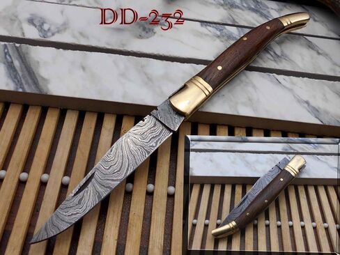 Laguiole Folding Damascus steel knife, 8.6" Long with 4" hand forged custom twist pattern Blade. Blue colored wood with brass bolster, Cow hide leather sheath included in Saudi Arabia