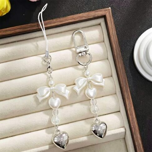 2Pcs Cute Phone Charms Aesthetic Keychain Y2K Bow Pearl Heart Cell Phone Charms Strap Camera Charm Strap Handbag Purse Bag Charm Cellphone Keychains For Women Hanging Pendant Decorations Accessories in Kuwait