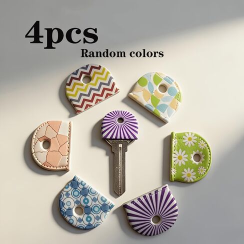 4pcs (Random Colors) of Colorful Silicone Keycaps Featuring Unique Designs Such As Stripes, Flowers, and Polka Dots in Kuwait