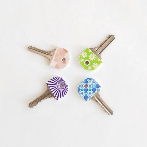 4pcs (Random Colors) of Colorful Silicone Keycaps Featuring Unique Designs Such As Stripes, Flowers, and Polka Dots in Kuwait