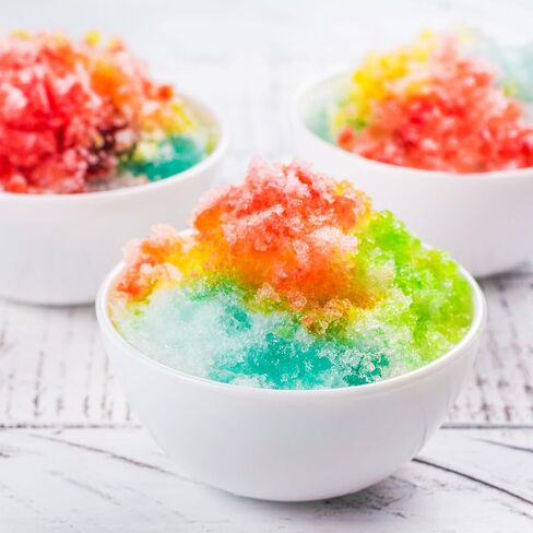 Nostalgia Snow Cone Shaved Ice Machine - Retro Table-Top Slushie Machine - Includes 1 Reusable Plastic Cup - Aqua in Kuwait