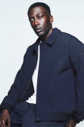 Alo Yoga Duality Bomber Jacket - Navy in Saudi Arabia