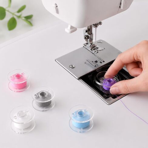 28 Pcs Class 15 Plastic Sewing Machine Bobbins with Storage Case in Kuwait