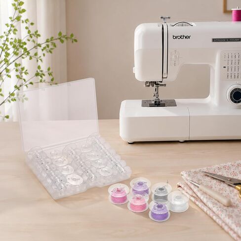 28 Pcs Class 15 Plastic Sewing Machine Bobbins with Storage Case in Kuwait