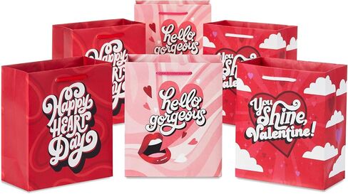 Hallmark 8" Medium Valentine's Day Gift Bags with Tissue Paper (3 Bags: Red with Black, Pink, White Stripes and Hearts) in Kuwait