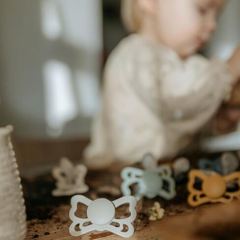 FRIGG Butterfly Anatomical SilkySoft Silicone Baby Pacifier | Made in Denmark | BPA-Free (Cedar/Baby Pink, 0-6 Months) in Saudi Arabia