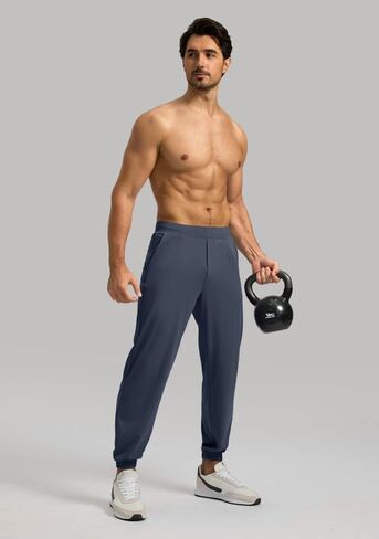 فيوديا سروال رياضي للرجال مع جيب بسحاب، سروال رياضي قابل للتمدد بقصة ضيقة للرجال للجري والتمارين الرياضية in Kuwait