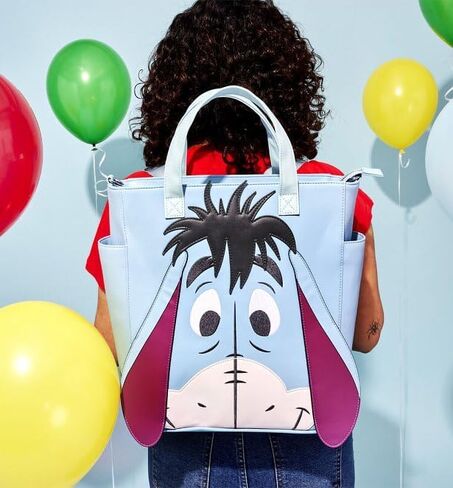 حقيبة يد Loungefly Eeyore Smile قابلة للتحويل ويني ذا بوه in Kuwait