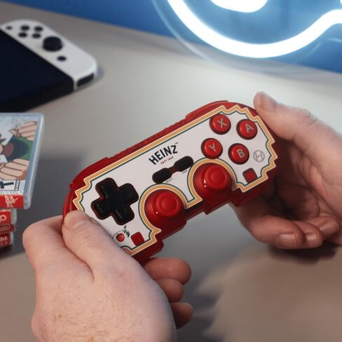 إصدار محدود من وحدة التحكم Bluetooth Heinz Pixel Art الرسمية من Hyperkin - مرخصة رسميًا - لجهاز Nintendo Switch®، والكمبيوتر الشخصي، وMac®، وAndroid®، وiOS® (Label Love) in Saudi Arabia