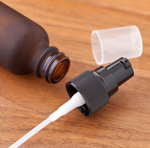 JUVITUS 1 oz / 30 ml Frosted Amber Glass Boston Round Bottle with Black Treatment Pump (24 pack) + Funnel in Saudi Arabia