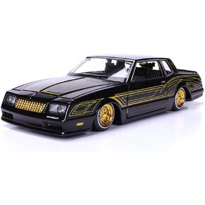 1986 Chevy Monte Carlo SS Lowrider Black Metallic with Gold Graphics and Wheels Lowriders Series 1/24 Diecast Model Car by Maisto 32542BK