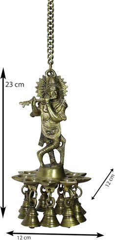 لوحة حائط eCraftIndia 'Lord Krishna Playing Flute' مع 9 فتيل زيتي (نحاس، 12 سم × 23 سم، بني، BGKDB101) in Kuwait