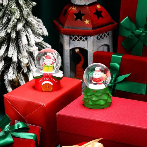 Shappy 2 Pcs Christmas Glitter Water Globe 1.77 inch Mini Snow Globe Santa Claus Christmas Tree Snowman Snow Christmas Elements Snow Globe House Decoration with LED Light for Family Office in Saudi Arabia