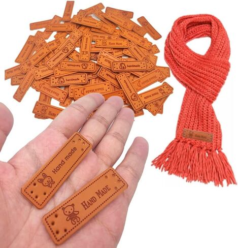 100 Pcs Handmade PU Leather Tags with Holes Rectangle Embossed Labels PU Leather Handmade Tags Handmade Knitting Labels for DIY Sweaters Scarves Bags Gloves Hats in Saudi Arabia