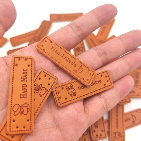 100 Pcs Handmade PU Leather Tags with Holes Rectangle Embossed Labels PU Leather Handmade Tags Handmade Knitting Labels for DIY Sweaters Scarves Bags Gloves Hats in Saudi Arabia
