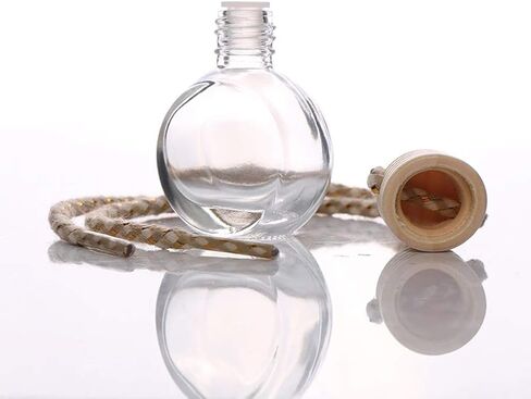 زجاجة ناشر الزيوت العطرية للعلاج العطري للسيارة، 10 عبوات من زجاجات معطر هواء السيارة الفارغة المعلقة وزجاجة عطر وإكسسوارات ديكور لتزيين نافذة السيارة (دائرية) in Kuwait