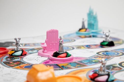 PlayMonster The Magical World of Disney Trivia: 100 Years of Wonder Trivia Board Game Cards for Children with Disney + Pixar Art, Exclusive Pin, for Kids Ages 6+ in Saudi Arabia