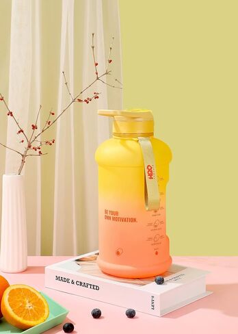 H2O Capsule INSPO Half Gallon Water Bottle with Time Marker and Straw Motivational Hydration Tracker Jug Big BPA-Free FoodSafe Leakproof Drinking Bottle Handle & Strap, Sunny Morning in Saudi Arabia