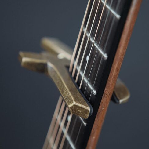 The Lorian Capo, Heavy Duty Guitar Capo for Acoustic and Electric Guitar with Adjustable Tension Spring, Twist the Spring to Adjust the Tension and Aperture 6, 7 and 12 String Guitars, Cast Iron Capo in Saudi Arabia