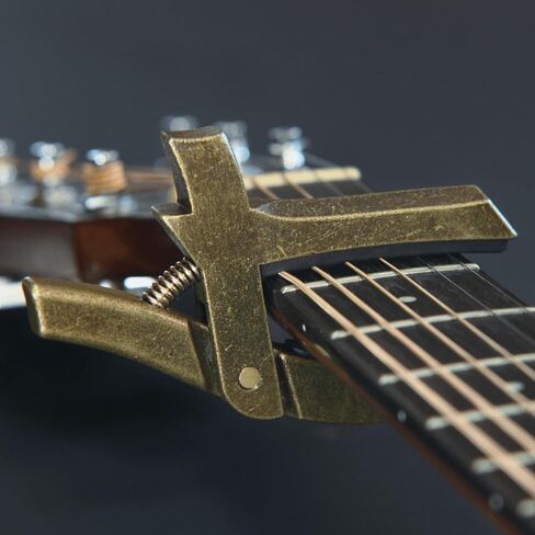 The Lorian Capo, Heavy Duty Guitar Capo for Acoustic and Electric Guitar with Adjustable Tension Spring, Twist the Spring to Adjust the Tension and Aperture 6, 7 and 12 String Guitars, Cast Iron Capo in Saudi Arabia