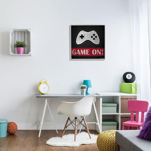 Stupell Industries Game On Bold Gamer Phrase Retro Controller, Designed by Denise Brown Gray Framed Wall Art, 24 x 24, Grey in Saudi Arabia