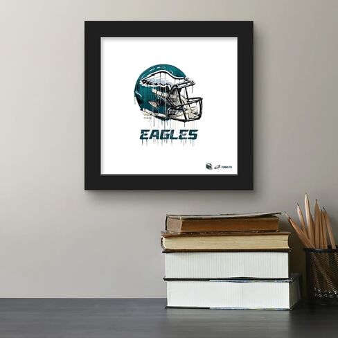 Trends International Gallery Pops NFL Philadelphia Eagles - Drip Helmet Wall Art Wall Poster, 12.00" x 12.00", Black Frame Version in Saudi Arabia