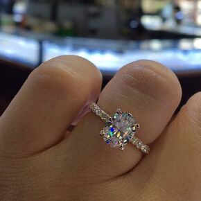 XIALV Rose Gold Plated Cubic Zirconia 2 Carats Oval Cut Ring Simulated Diamond CZ Wedding Engagement Ring for Women (US size 7)