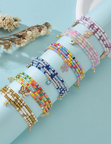 Akeoqi 10 قطع سلاسل خرز الخصر وسلاسل البطن الأفريقية بالإضافة إلى حجم ملون بوهو الزجاج حبة الجسم سلسلة الصيف بيكيني للشاطئ مجموعة مجوهرات مثيرة للنساء 31.5 بوصة in Kuwait