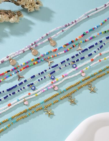 Akeoqi 10 قطع سلاسل خرز الخصر وسلاسل البطن الأفريقية بالإضافة إلى حجم ملون بوهو الزجاج حبة الجسم سلسلة الصيف بيكيني للشاطئ مجموعة مجوهرات مثيرة للنساء 31.5 بوصة in Kuwait