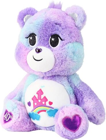 Care Bears Care-a-Lot Bear - الذكرى السنوية الأربعون - قطيفة أرجوانية للأعمار من 4 سنوات فما فوق - حيوانات محشوة، فائقة النعومة ومحبوبة - مناسبة للفتيات والفتيان والموظفين وهواة الجمع، هدية رائعة لعيد الحب للأطفال in Saudi Arabia