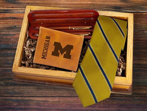 محفظة NCAA Michigan Wolverines للرجال بنية ثلاثية الطي - شعار الفريق الفاخر 10 جيوب منقوش بالليزر على جلد نباتي - تصميم بسيط، نافذة لبطاقة الهوية، حامل بطاقة الائتمان - هدية مثالية للرجال in Saudi Arabia