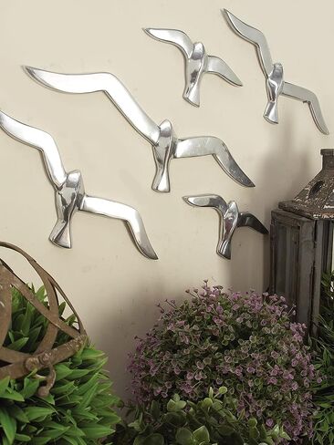 Deco 79 Aluminum Metal Bird Home Wall Decor Floating Flock of Wall Sculpture, Set of 7 Wall Art 16"W, 4"H, Silver in Saudi Arabia