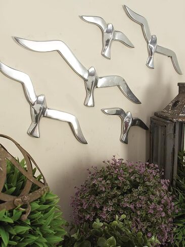 Deco 79 Aluminum Metal Bird Home Wall Decor Floating Flock of Wall Sculpture, Set of 7 Wall Art 16"W, 4"H, Silver in Saudi Arabia