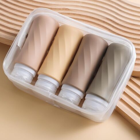 Travel Bottles for Toiletries, Tsa Approved 3.3oz Portable Travel Bottles, BPA Free Leak Proof Squeezable Silicone Travel Size Containers, Travel Accessories with Clear Toiletry Bag (4 Pack) in Saudi Arabia