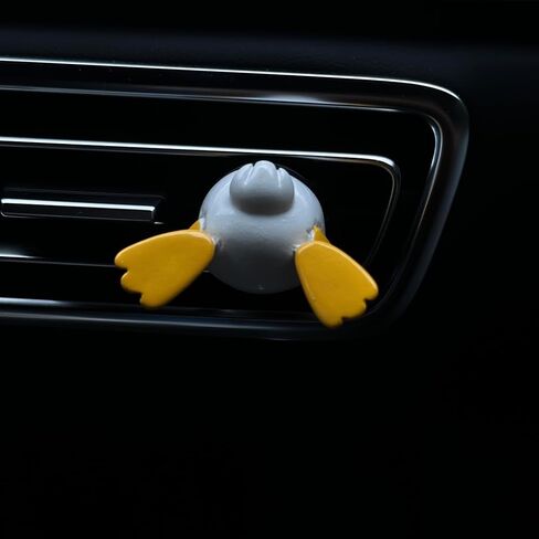 زينة ومشبك فتحة تهوية السيارة بشكل ظريف على شكل بطة مع جهاز معطر للهواء برائحة طبيعية وإعادة التعبئة، وإكسسوارات العلاج العطري للسيارة والديكور الداخلي in Kuwait