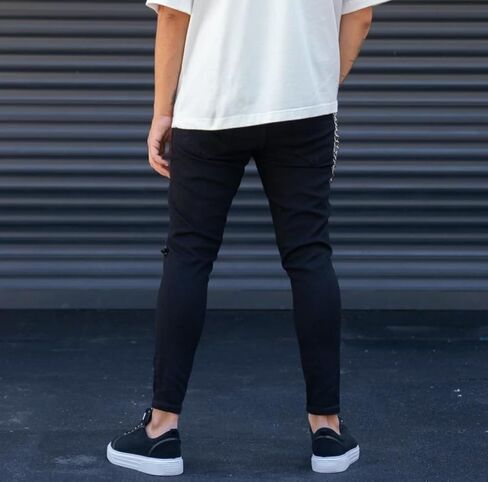 Solid Black Knee Cut Desing Denim Jeans for Men in Saudi Arabia