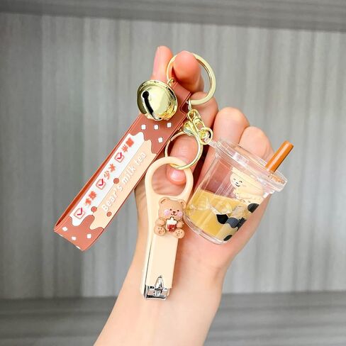 لطيف المفاتيح الدب البني السائل العائمة سلاسل المفاتيح Kawaii المفاتيح الاكسسوارات حقيبة الظهر حقيبة سحر سيارة حلقة رئيسية للنساء فتاة in Kuwait