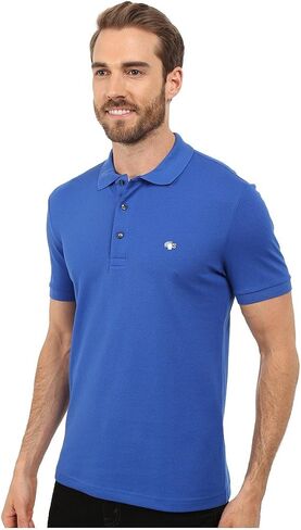 قميص بولو رجالي بأكمام قصيرة وقصة ضيقة من بيتي كروك بيكيه من Lacoste in Saudi Arabia